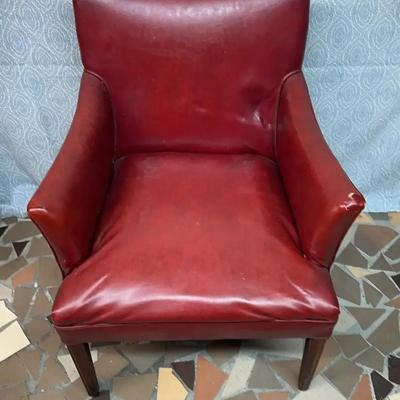 Vintage Danish Modern armchair in oxblood leather. 