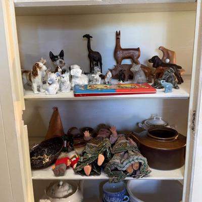 Small Collectible Items Inside Cabinet