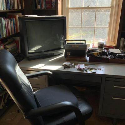 Office Desk, Chair Transitor Radio, TV, Camera’s, CD Radio And Misc