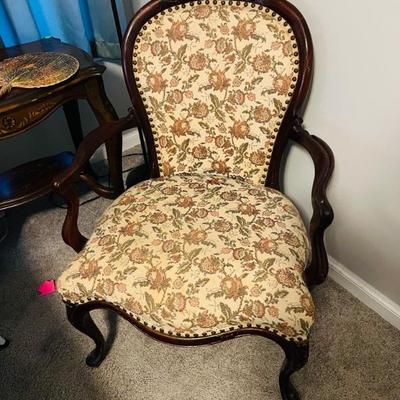 Antique wooden upholstered chair