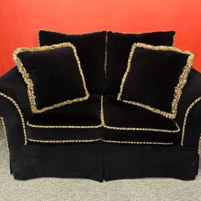 Custom black velvet loveseat, loose cushion back, two coordinating throw pillows, 70“ x 40“ x 40“