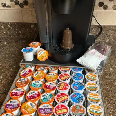 Keurig Coffee Maker With POD Storage Rack Filled With Assorted Coffees