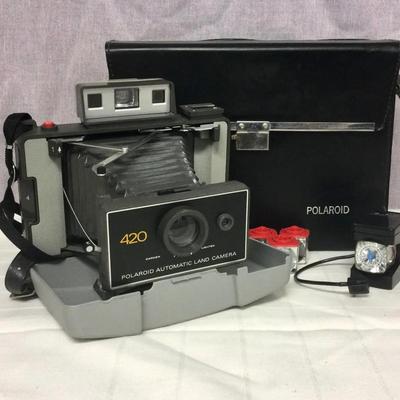Polaroid 420 Vintage Camera, With Focused Flash, Spare Bulbs, And Carrying Case
