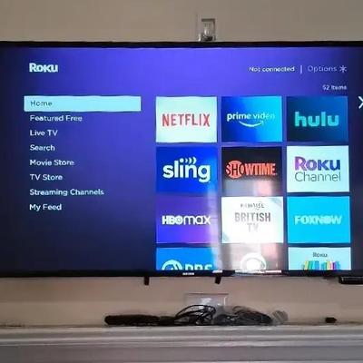 Samsung Flat Screen TV with Roku, including Remotes
