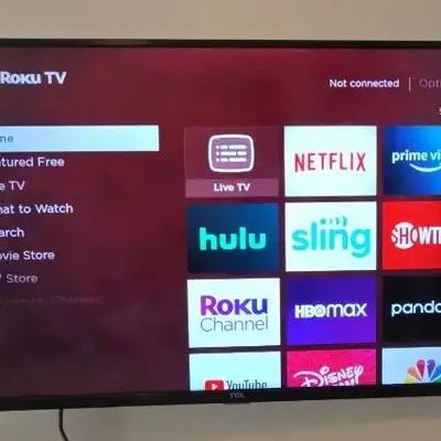 44" TCL Flat-Screen Roku TV, featuring Wall-Mounted Setup & Accessories
