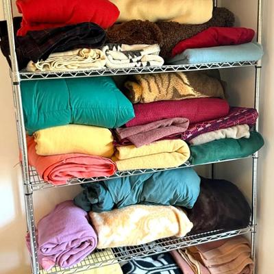 A large number of vintage new blankets