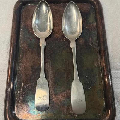 A pair of german coin silver serving spoons