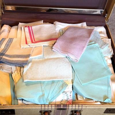 Suitecase full of vintage linens