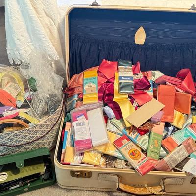 A suitcase full of blanket binding ribbon