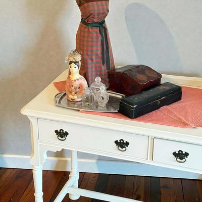 Small writing desk with sewing notions