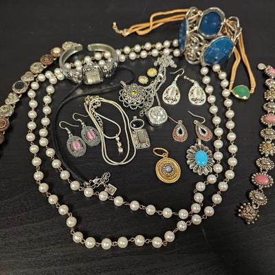 Copper Bracelet With Other Colorful Jewelry Pieces 