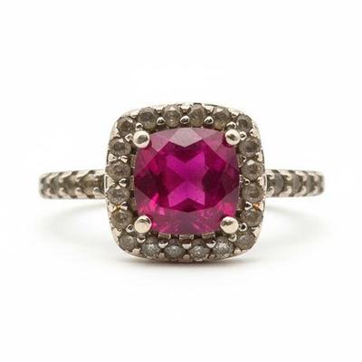 Lot 054   
1.30 Carat Pink Tourmaline & White Sapphire Sterling Silver Ring