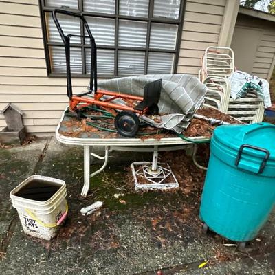 Patio table with chairs; hand truck; outdoor trash can