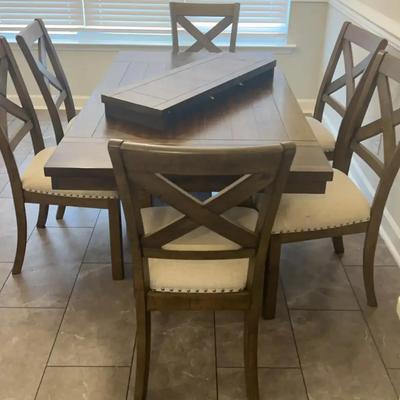 Ashley Furniture Dining Table, featuring Leaf Extension & Upholstered Seating