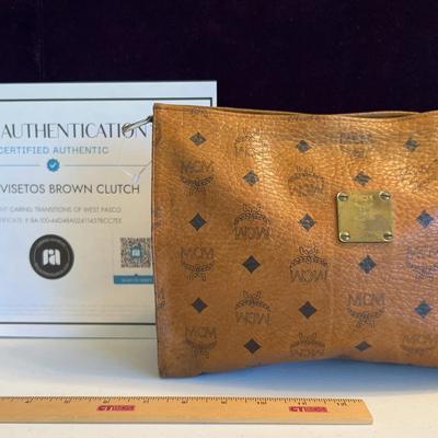 MCM Authentic Coated Canvas Clutch Cognac 