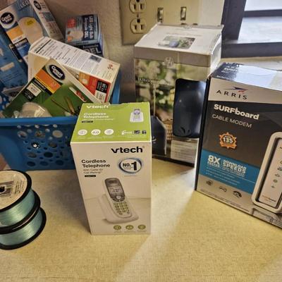 Electronics & Party Supplies Mega Lot – Modem, VTech Phone, LED Bulbs, Décor & Birthday Items