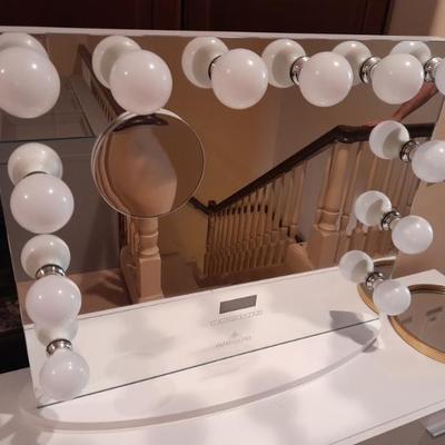 Sale Photo Thumbnail #51: Impressions vanity mirror with Blue Tooth technology, embedded speaker system, light dimming, time and weather report functions