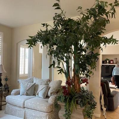 Large faux palm tree and plants 