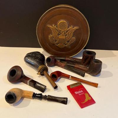 Vintage Tobacco Pipes, Antique Powder Flask & Eagle‑Emblem Tin