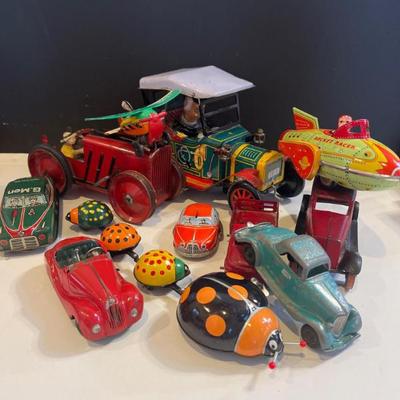 Vintage Tin Vehicles & Wind‑Up Toys