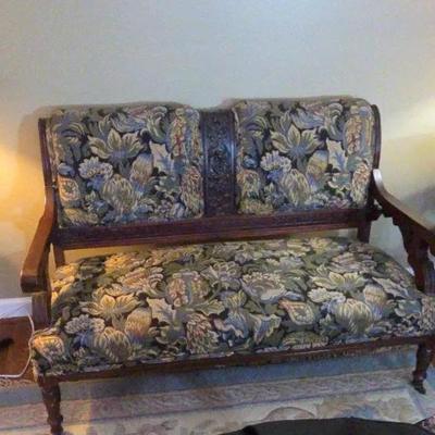 Antique Victorian Eastlake-Style Settee Carved On Casters