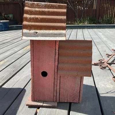 Triple Birdhouse With A Metal Roof