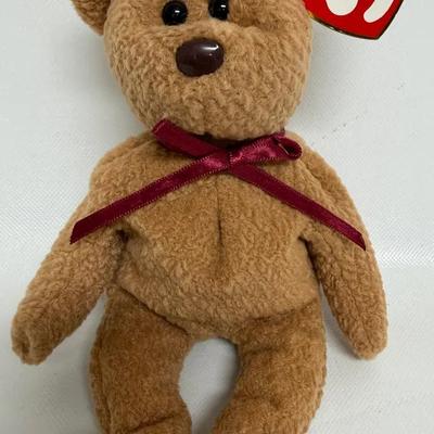 Retired “TY Beanie Baby” Curly 