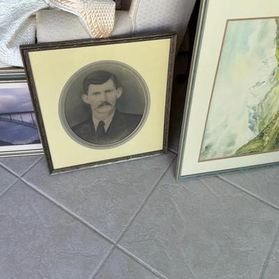 Assorted Framed Wall Art Including Vintage Portrait, Landscape Print, and Architectural Photograph