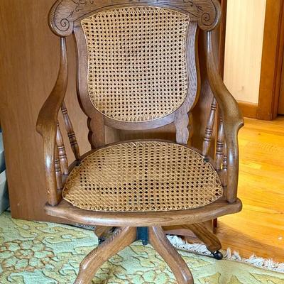 19th-century Victorian walnut and caned seat and back rolling office chair