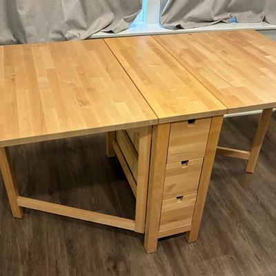 Drop leaf table with storage drawers