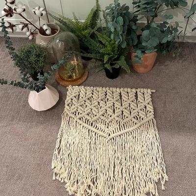 Artificial plants and boho macrame walk hanging
