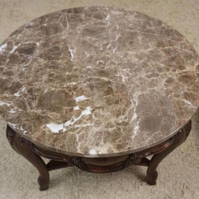 Sale Photo Thumbnail #228: 1229	PAIR OF ROUND MARBLE TOP LAMP TABLES ON CARVED WOOD BASES, EACH APPROXIMATELY 28 IN X 27 IN H
