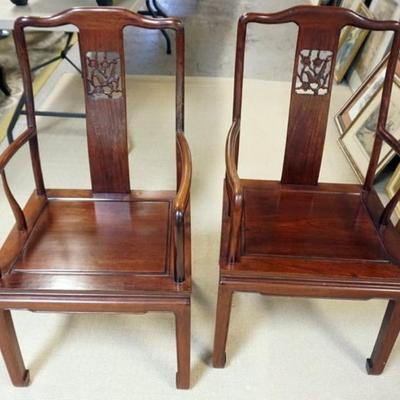 Sale Photo Thumbnail #191: 1192	PAIR OF ROSEWOOD PIERCED CARVED BIRD AND FLOWER ARM CHAIRS
