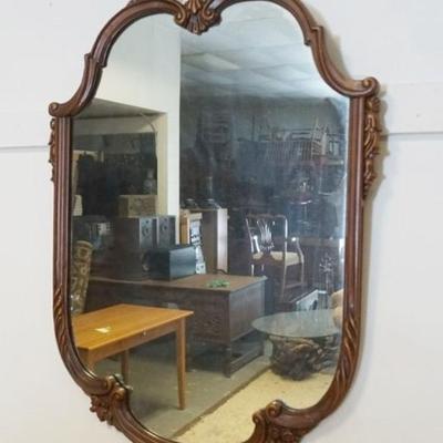 Sale Photo Thumbnail #84: 1084	HANGING MIRROR IN ORNATE WALNUT FRAME, APPROXIMATELY 43 IN X 30 IN

