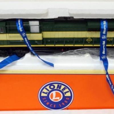 Sale Photo Thumbnail #174: 1175	LIONEL O GAUGE TRAINS, ERIE DIESEL LOCOMOTIVE IN BOX
