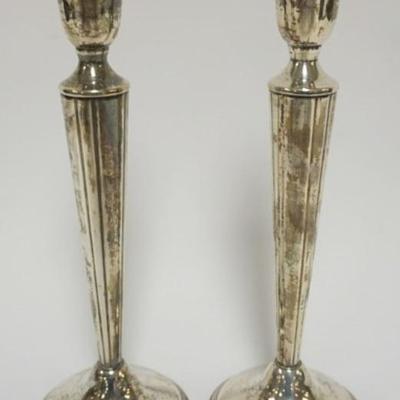 Sale Photo Thumbnail #11: 1011	STERLING SILVER WEIGHTED CANDLE STICKS, APPROXIMATELY 10 IN H
