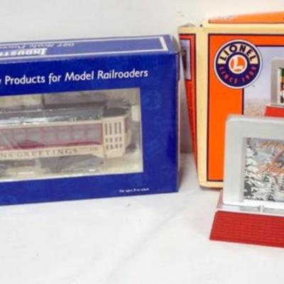 Sale Photo Thumbnail #179: 1180	LIONEL TRAINS CHRISTMAS OPERATING BILLBOARD AND INDUSTRIAL O GAUGE CHRISTMAS TROLLY
