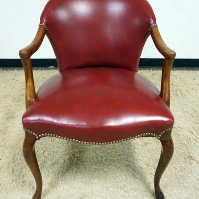 Sale Photo Thumbnail #204: 1205	RED LEATHER ARM CHAIR WITH BRASS TACK ACCENTS, APPROXIMATELY 25 IN X 22 IN X 35 IN H
