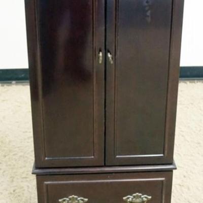 Sale Photo Thumbnail #231: 1232	FLOOR STANDING DOUBLE DOOR JEWELRY CHEST, APPROXIMATELY 18 IN X 15 IN X 38 IN H
