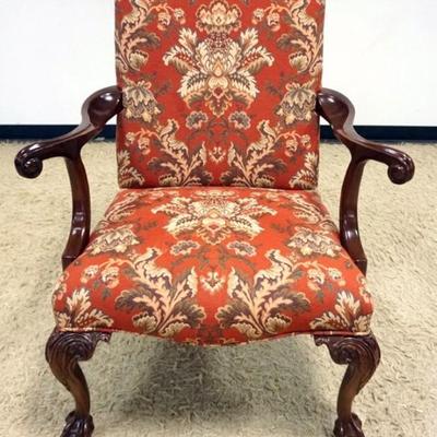 Sale Photo Thumbnail #217: 1218	SOUTHWOOD UPHOLSTERED ARM CHAIR WITH CARVED CABRIOLE AND BALL & CLAW FEET, APPROXIMATELY 32 IN X 28 IN X 42 IN H

