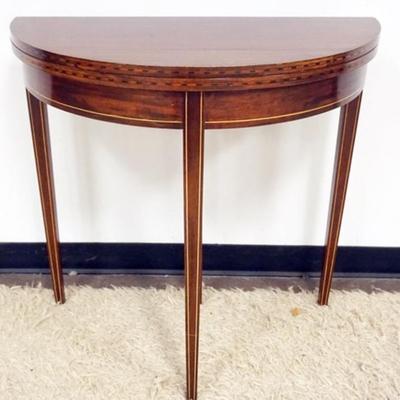 Sale Photo Thumbnail #206: 1207	MAHOGANY DEMILUNE FLIP TOP TABLE WITH PENCIL INLAY AND BANDED BORDER, APPROXIMATELY 32 IN X 16 IN X 31 IN H, OPEN 32 IN
