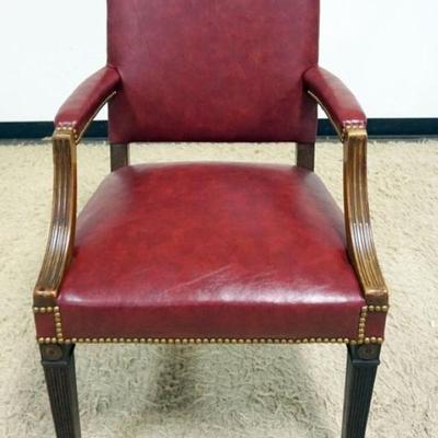 Sale Photo Thumbnail #205: 1206	RED LEATHER ARM CHAIR WITH BRASS TACK ACCENTS, APPROXIMATELY 25 IN X 22 IN X 35 IN H
