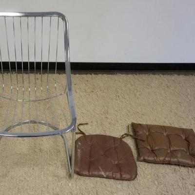 Sale Photo Thumbnail #234: 1235	MID CENTURY MODERN CHROME WIRE CHAIR, APPROXIMATELY 20 IN X 23 IN X 34 IN H, SOME SEAL RIBS DETACHED
