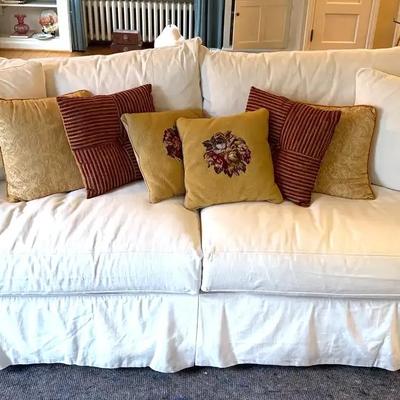 Cream slip covered sofa