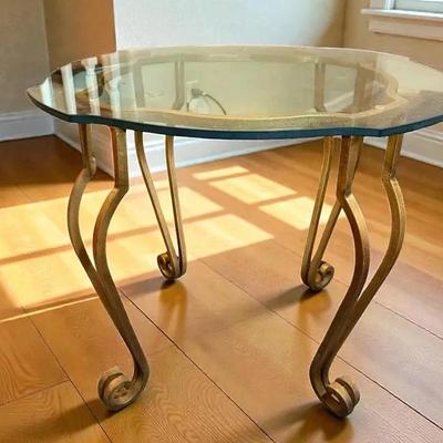 Gilt iron glass accent table.