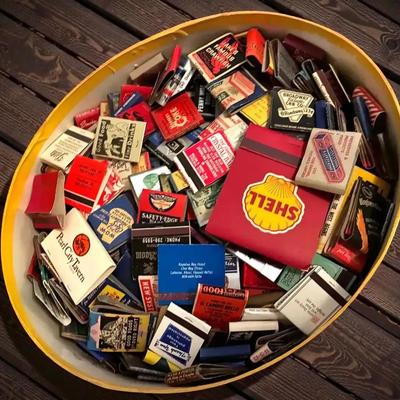 Hat box full of vintage matchbooks