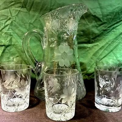 Cut crystal floral pattern pitcher and drinking glasses