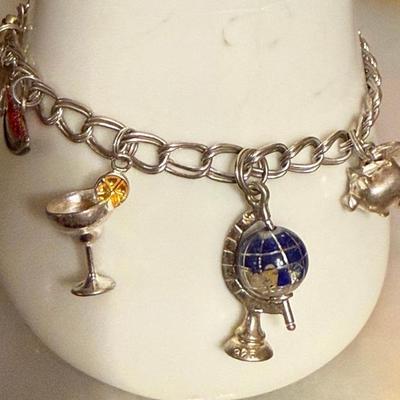 Vintage Sterling Silver 7 Inch Charm Bracelet With Sterling Charms - 22.77 Grams