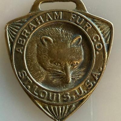 Antique Abraham Fur Co Brass Advertising Watch Fob St Louis USA
