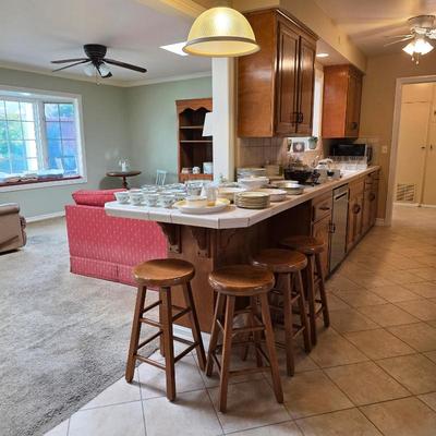 Sale Photo Thumbnail #3: Solid wood counter height rotating barstools